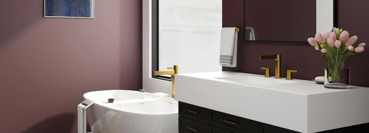 Riobel Paradox widespread faucet and floor-mount tub filler in brushed gold