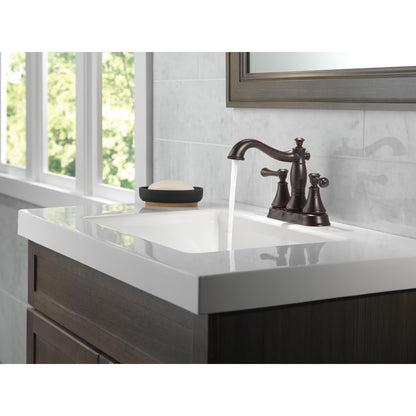 Robinet de salle de bain Delta Cassidy à deux poignées et entraxe de 10 cm – Bonde escamotable en métal – 2597LF