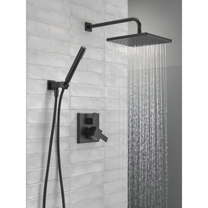 Delta Mitigeur de douche moderne Série 14 avec pommeau de douche effet pluie, douchette à main et robinet brut - 342701