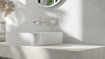 Baril Profile B46 B46-8041-00L wall-mounted lavatory faucet in Brushed Nickel, installed setting