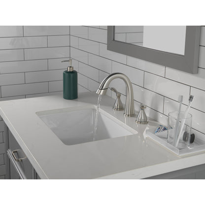Robinet de salle de bain Delta Stryke à deux poignées et douchette extensible