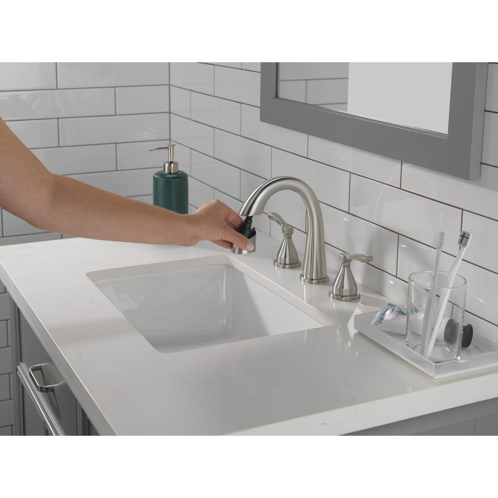 Robinet de salle de bain Delta Stryke à deux poignées et douchette extensible