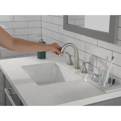 Robinet de salle de bain Delta Stryke à deux poignées et douchette extensible