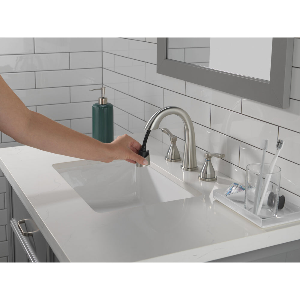 Robinet de salle de bain Delta Stryke à deux poignées et douchette extensible